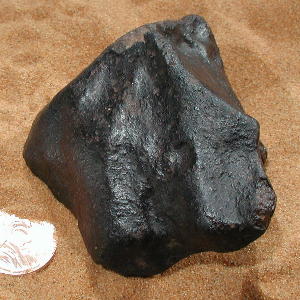 black meteorite rock identification